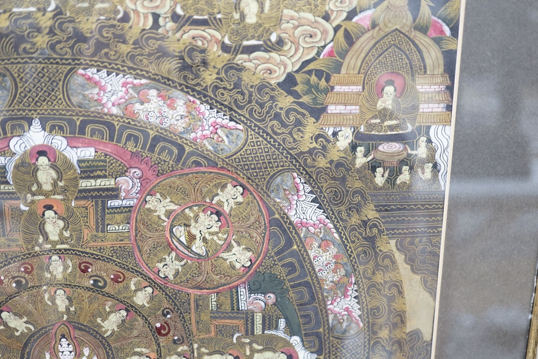 A painted thangka., 35 cms wide x 46 cms high.